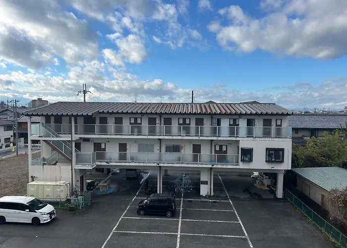 彦根市びわこホテルマンション 50台無料駐車場付き台所あり自動麻雀卓 自転車貸出可 Bbq可 ペット同伴可別途清掃料